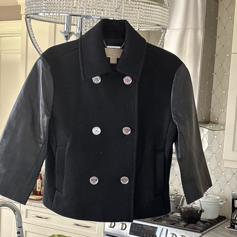 Michael Kors, black pea coat size small with three-quarter faux leather sleeves